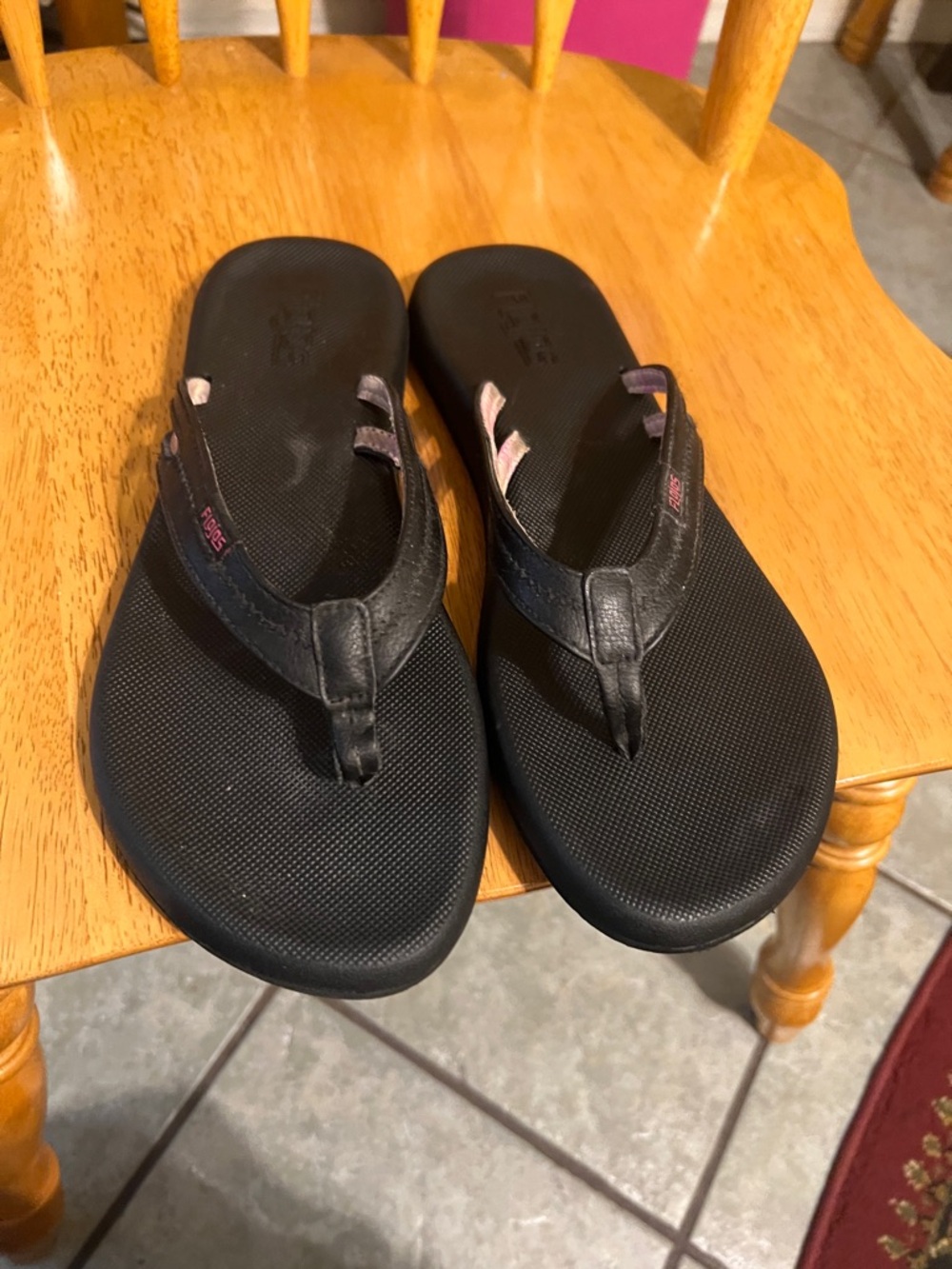 Flojos Black Flip Flop Sandals with Subtle Pink Accents